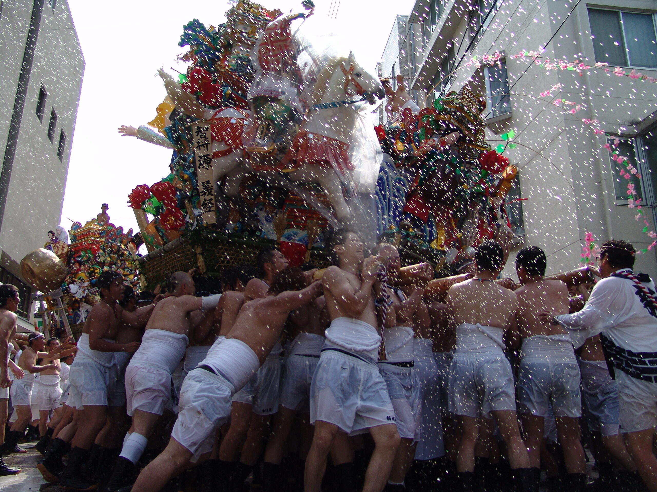 Gonoura Gion Yamakasa float carried up stone steps, Iki Island, Nagasaki